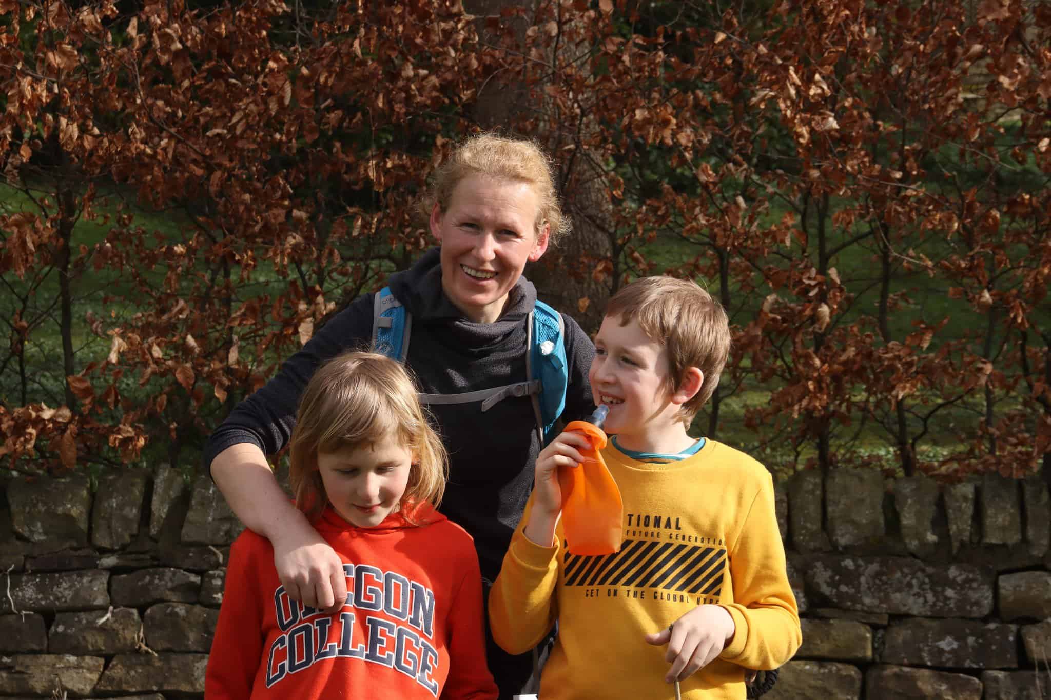 Mother and sons after finishing a marathon 