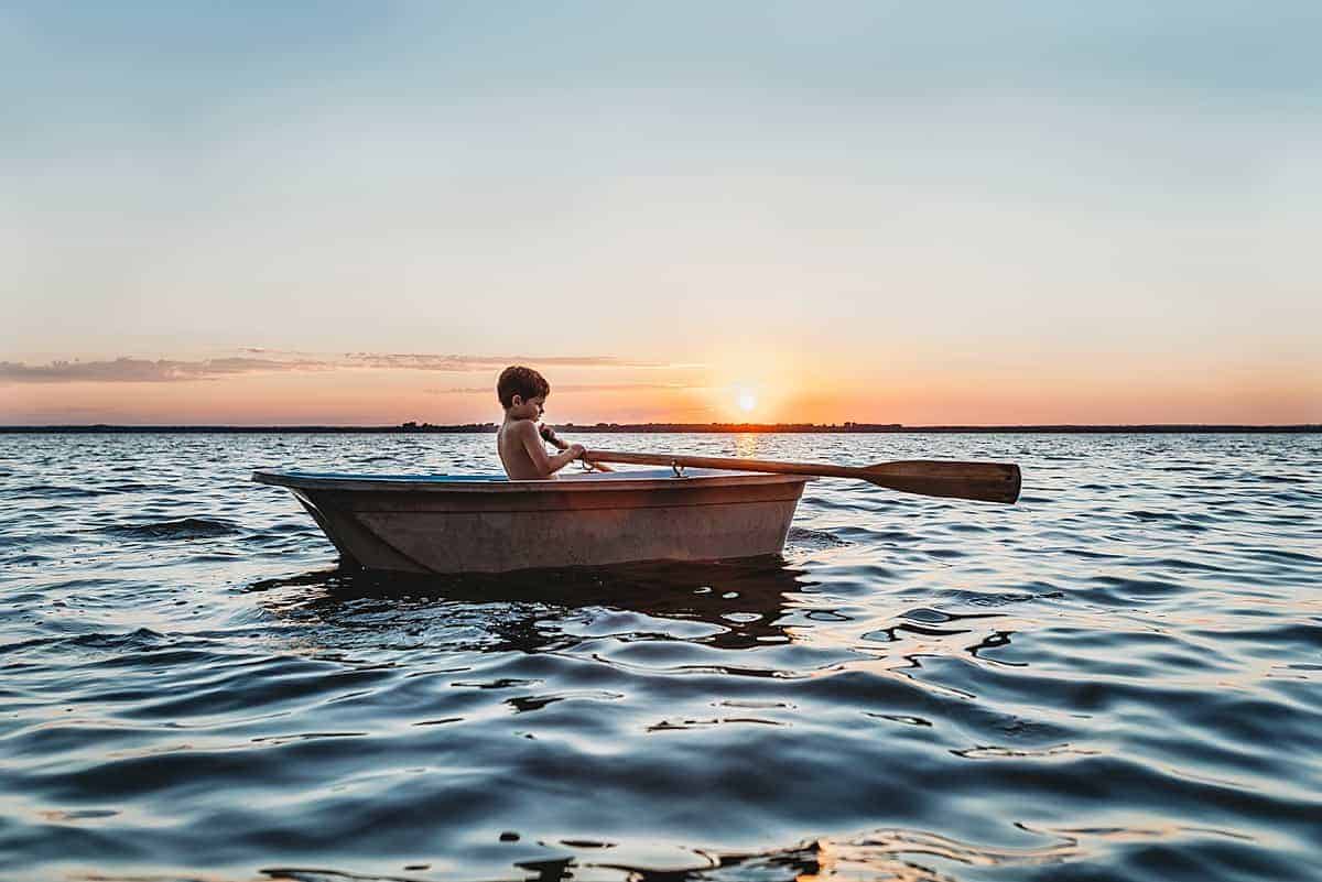 kids on a row boat - favorite water activities for kids