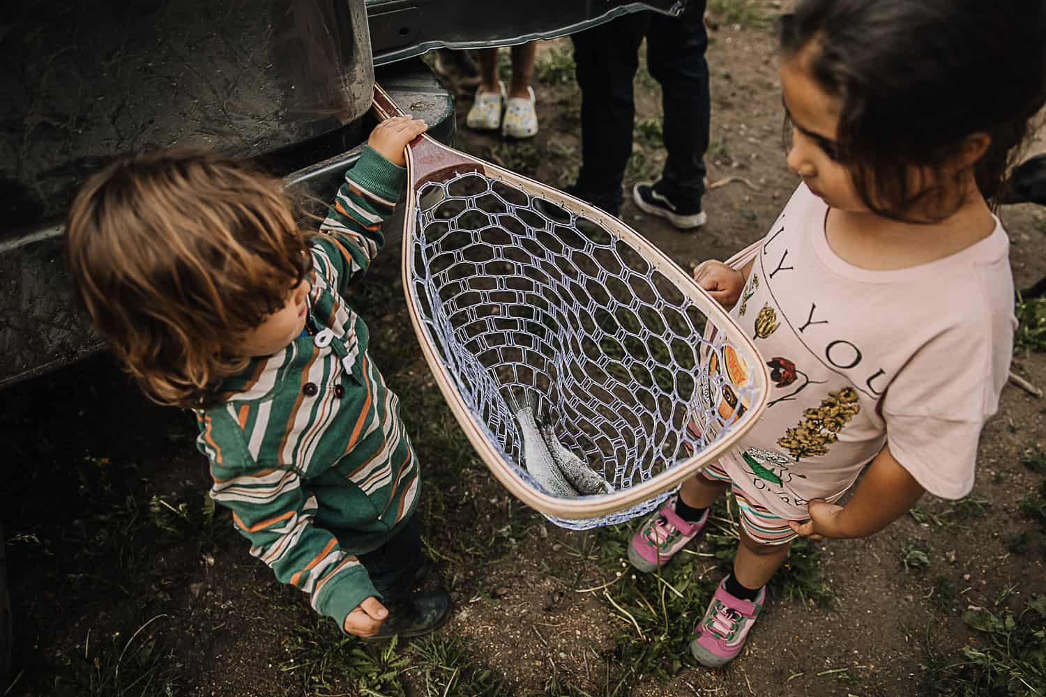 fly fishing with kids - how to land a fish