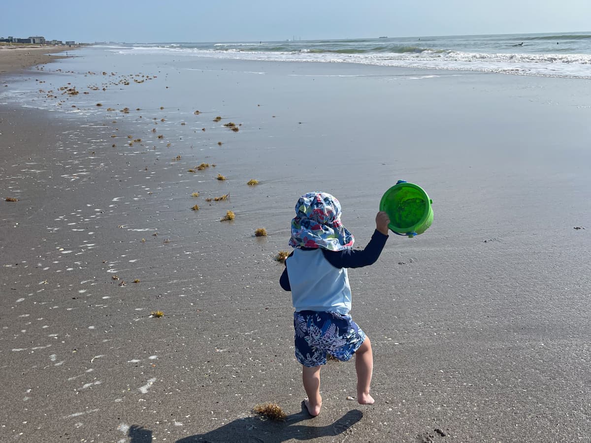 Kid on beach in Cocoa Beach, FLA. 