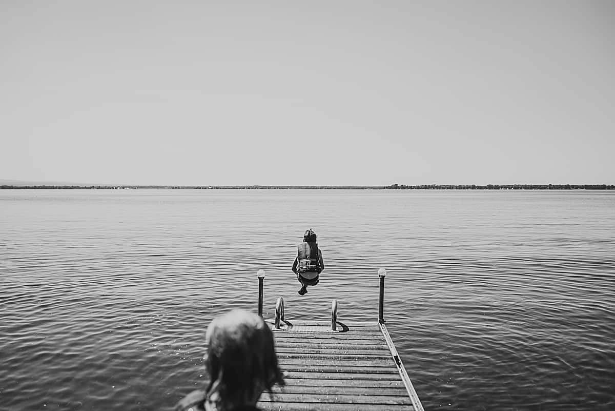 kids jumping off the dock at the lake - favorite water activities for kids