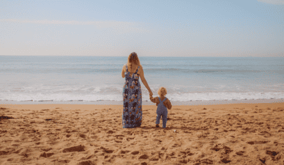 mother and child on Bournemouth beach, UK