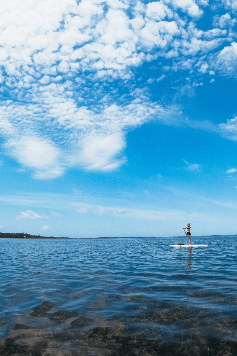 Teen girl on an SUP in Gulf County Florida